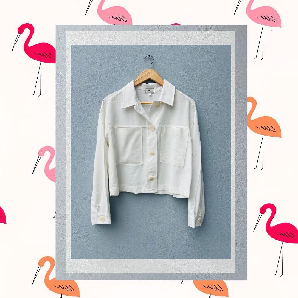 Jacket form women´s style blouse with buttons and bags on the front